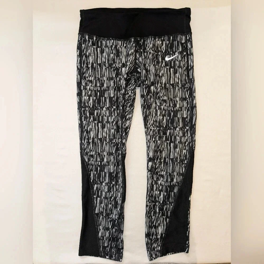 Nike women's graphic DRI-FIT tight running Capri leggings, size XS , black/white